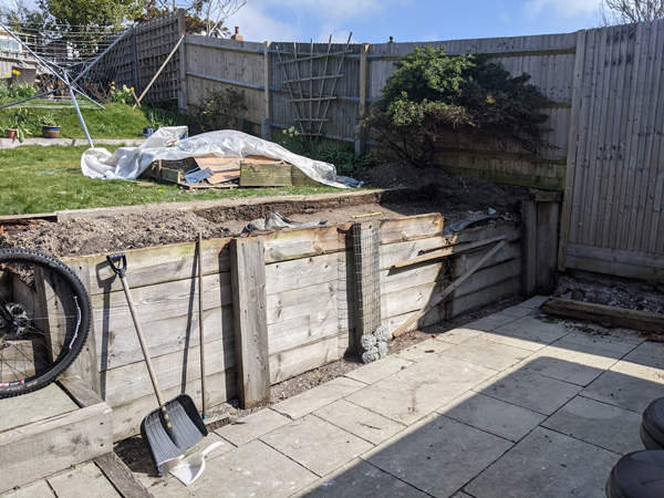 failed timber gabion wall