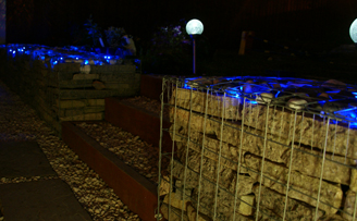 Gabion wall using Reclaimed slab and lighting